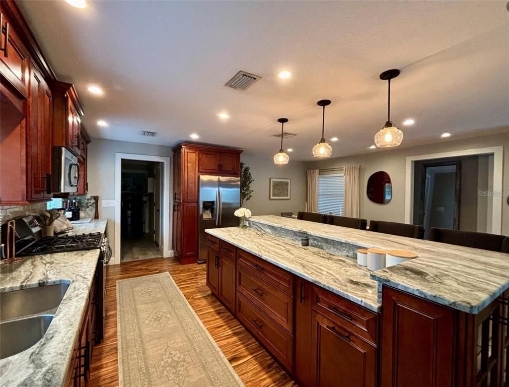 Interior, Kitchen, Pendant Lights, Recessed Lighting, Stainless Steel Appliances, Wood Texture Flooring