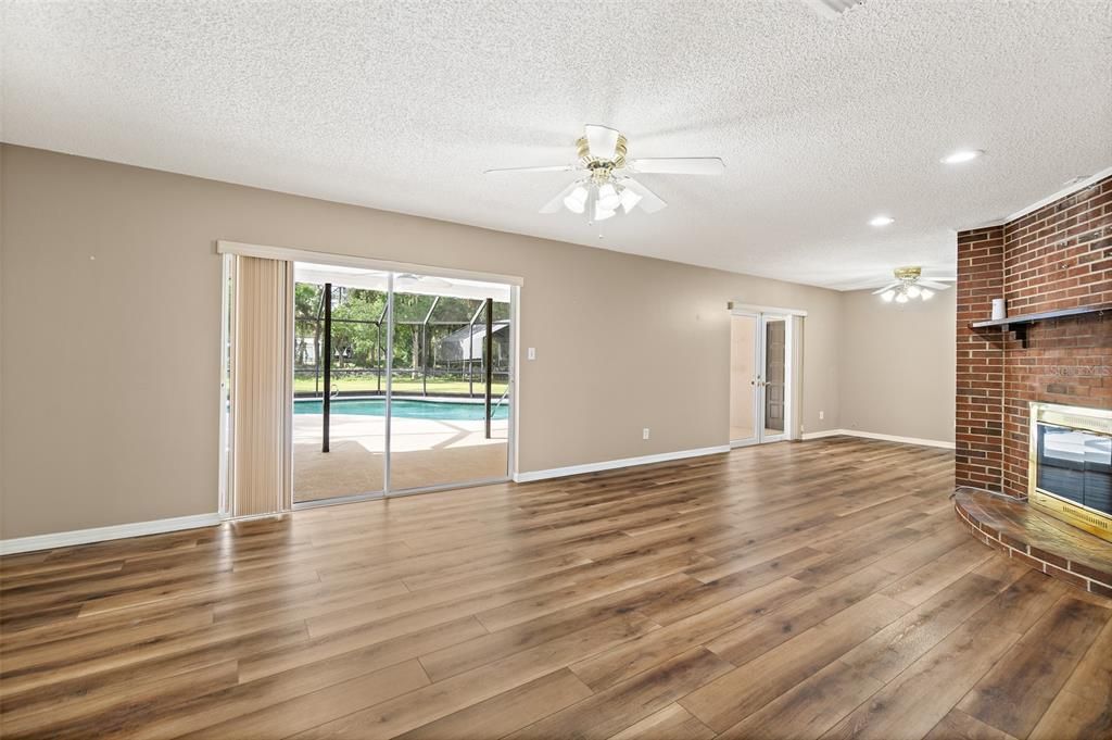Empty room, Interior, Recessed Lighting, Stone Walls, Wood Texture Flooring