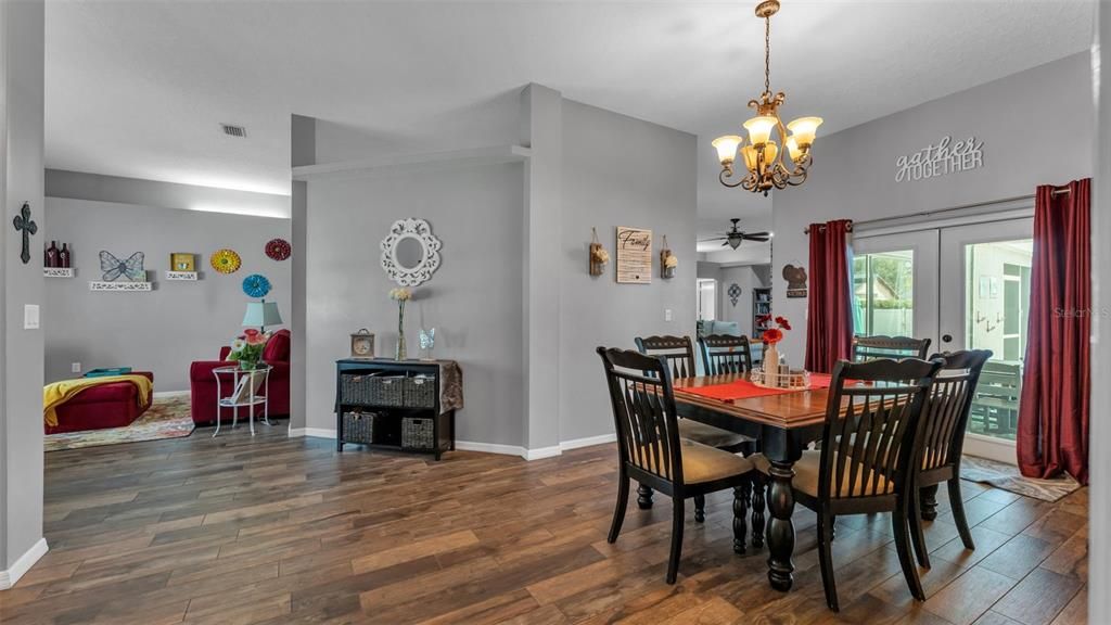 Chandelier, Dining room, Fireplace, Interior, Wood Texture Flooring