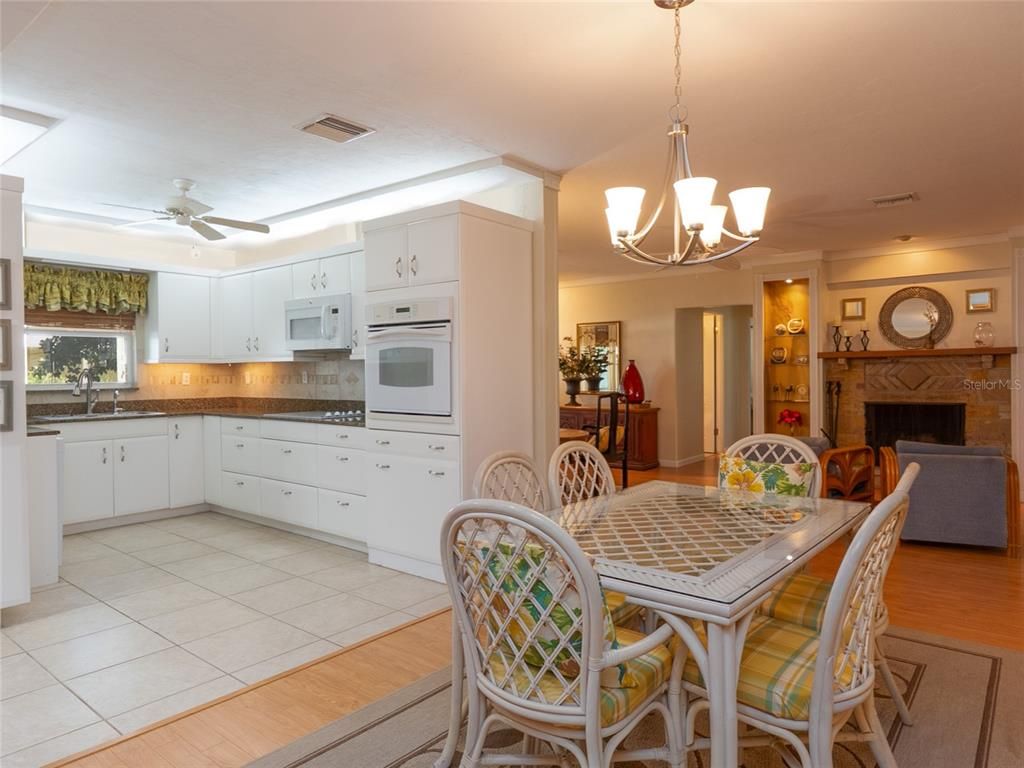 Chandelier, Dining room, Fireplace, Interior, Kitchen, Pendant Lights