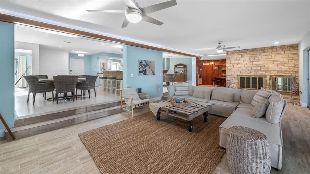 Dining room, Interior, Living room, Recessed Lighting, Stone Walls, Wood Texture Flooring