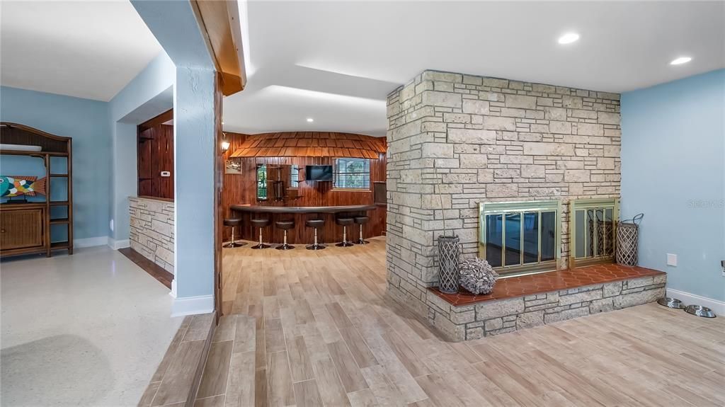 Fireplace, Interior, Recessed Lighting, Stone Walls, Wood Texture Flooring