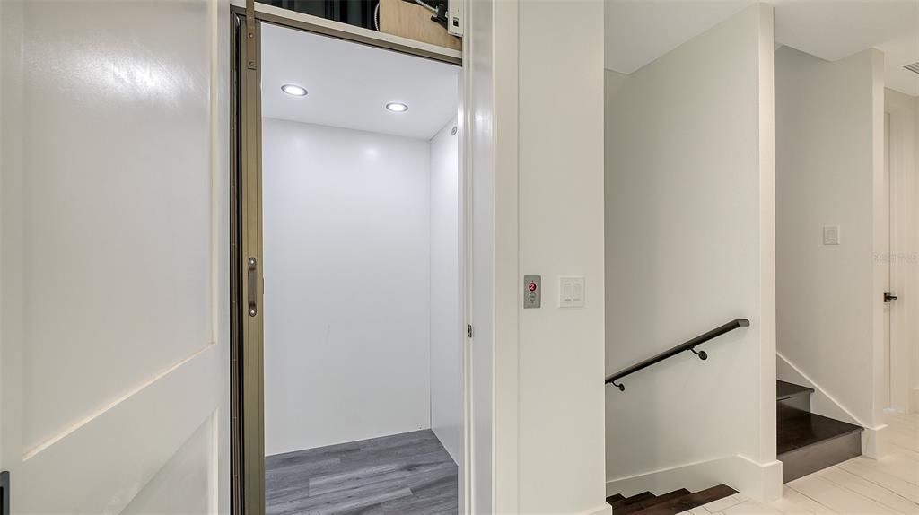 Elevator, Interior, Recessed Lighting, Wood Texture Flooring