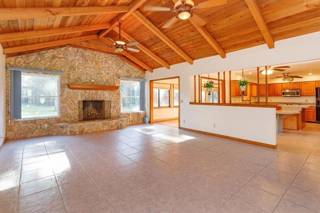 Empty room, Fireplace, Interior, Kitchen, Recessed Lighting, Stone Walls, Wooden Beams, Wooden Ceilings