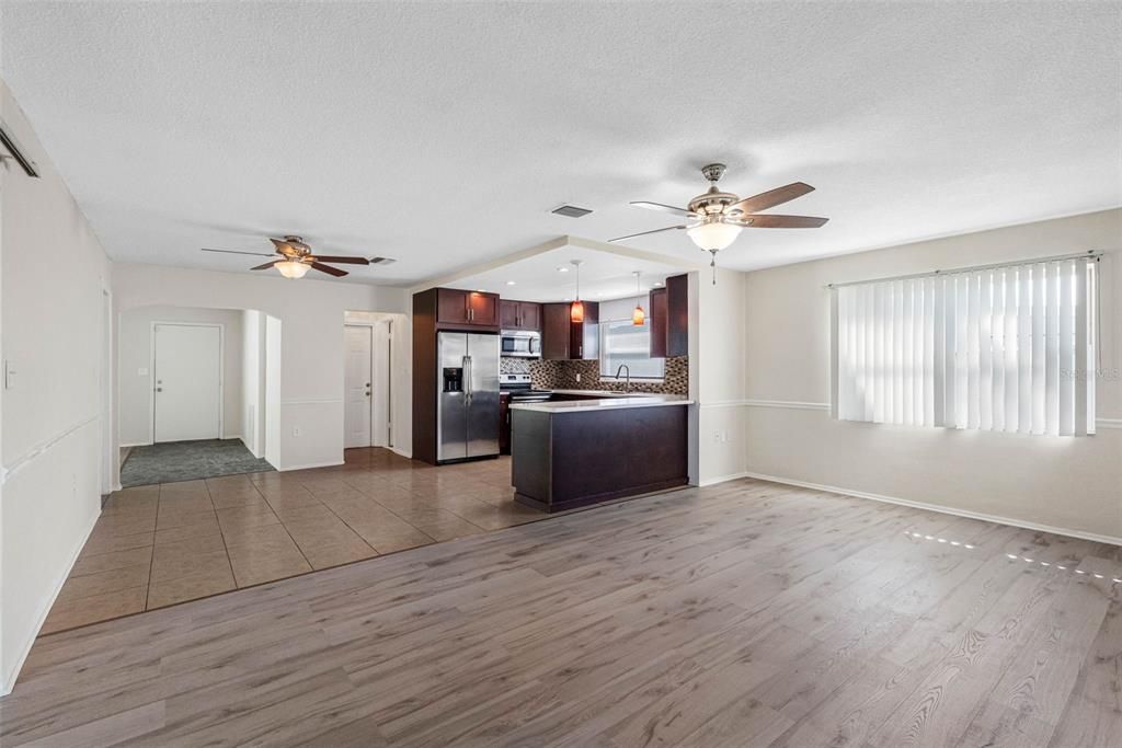 Empty room, Interior, Kitchen, Stainless Steel Appliances, Wood Texture Flooring