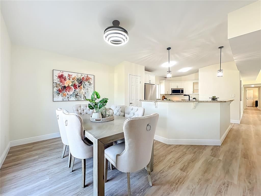 Dining room, Interior, Kitchen, Pendant Lights, Stainless Steel Appliances, Wood Texture Flooring