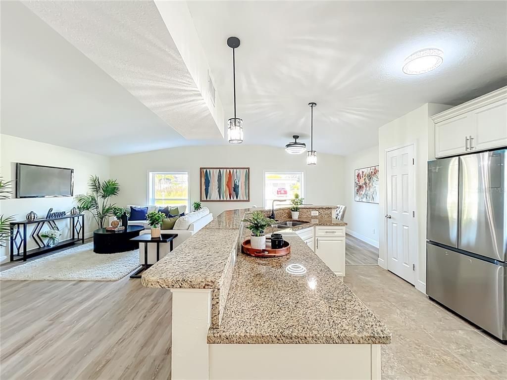 Dining room, Interior, Kitchen, Living room, Pendant Lights, Stainless Steel Appliances, Wood Texture Flooring