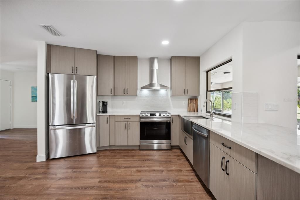 Interior, Kitchen, Recessed Lighting, Stainless Steel Appliances, Wood Texture Flooring
