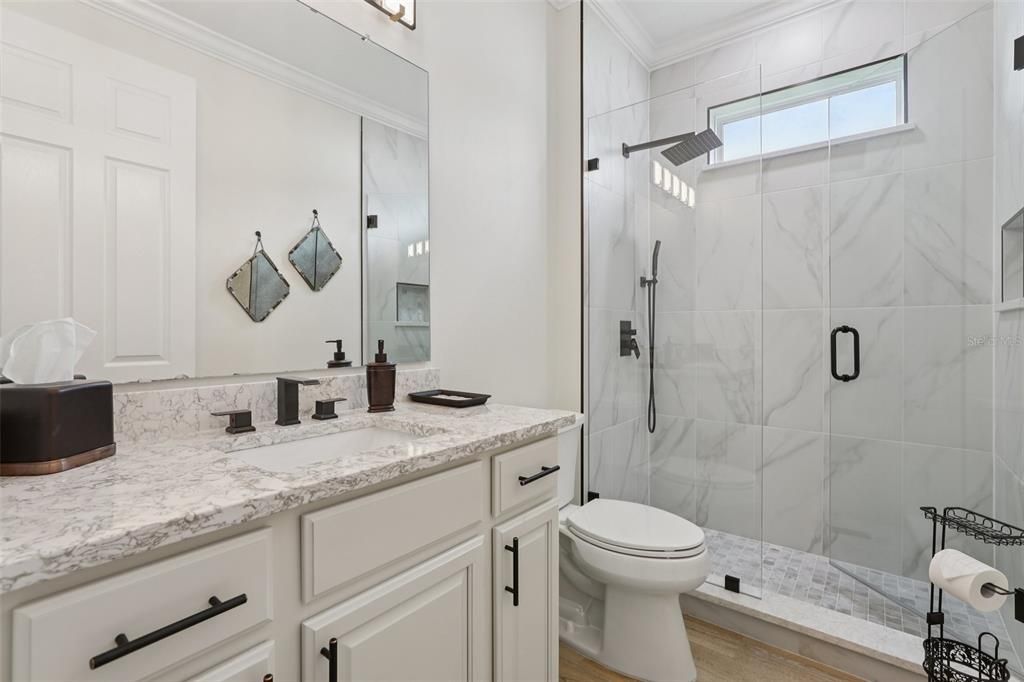 Bathroom, Glass Shower, Interior, Marble Walls, Wood Texture Flooring