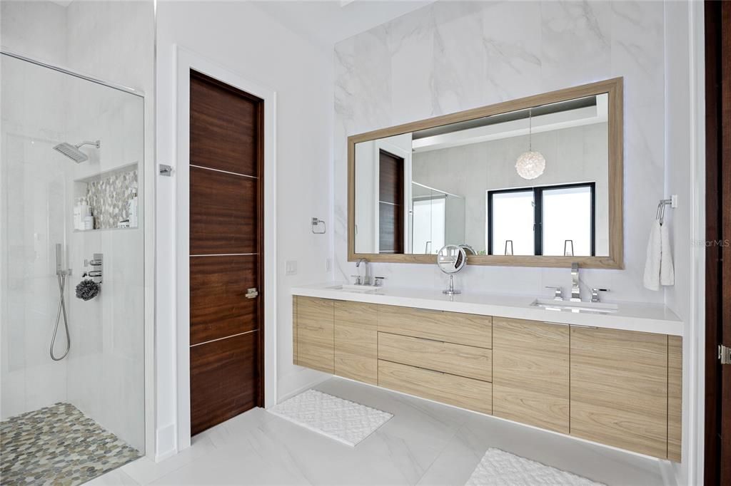 Bathroom, Dual Sink Vanities, Interior, Marble, Marble Walls, Pendant Lights