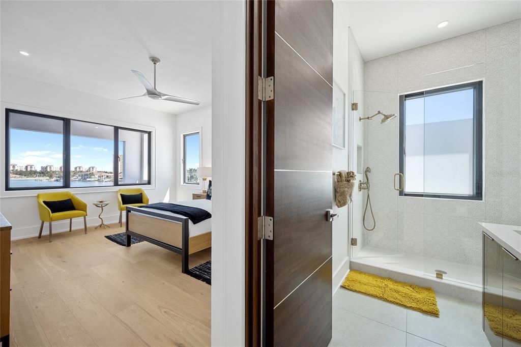 Bathroom, Bedroom, Glass Shower, Interior, Recessed Lighting, Water, Wood Texture Flooring