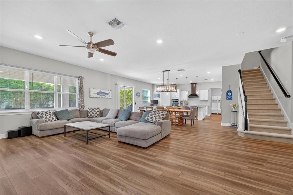 Dining room, Interior, Kitchen, Living room, Pendant Lights, Recessed Lighting, Stainless Steel Appliances, Wood Texture Flooring