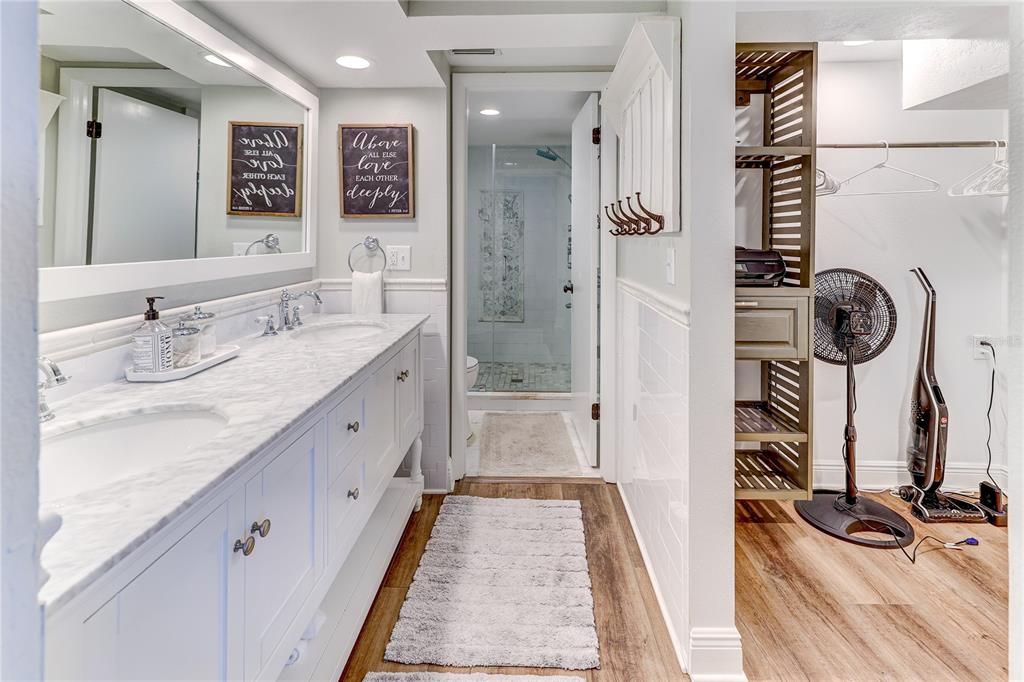 Bathroom, Dual Sink Vanities, Glass Shower, Interior, Recessed Lighting, Wood Texture Flooring