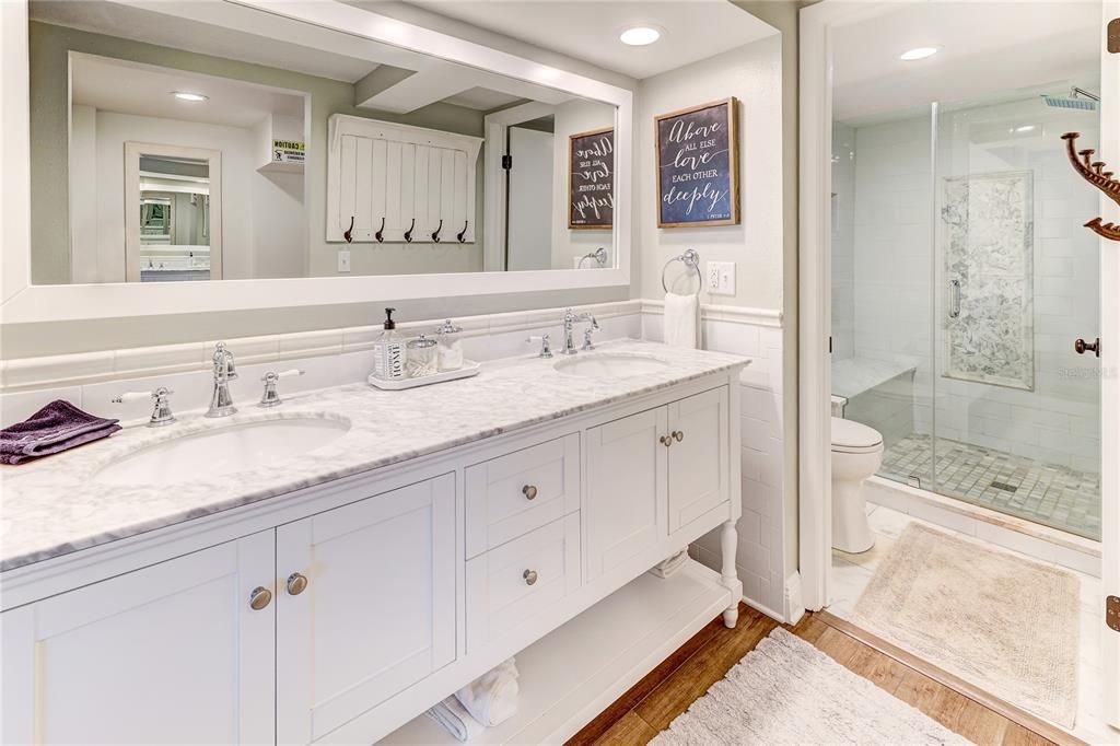 Bathroom, Dual Sink Vanities, Glass Shower, Interior, Recessed Lighting, Wood Texture Flooring