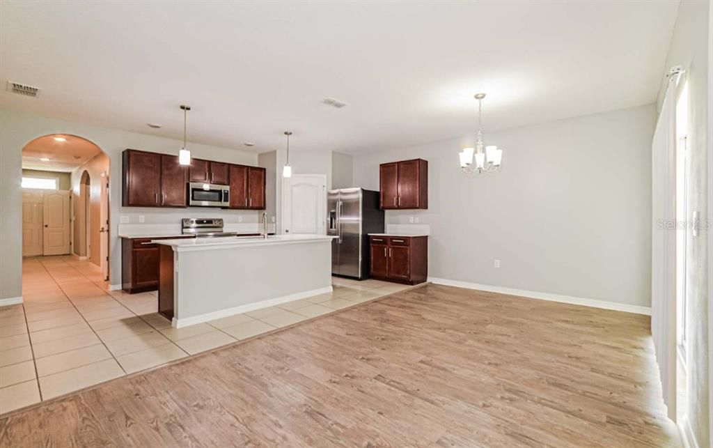 Chandelier, Interior, Kitchen, Pendant Lights, Stainless Steel Appliances, Wood Texture Flooring