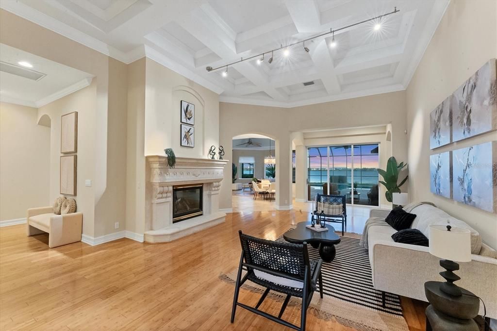 Fireplace, Interior, Living room, Recessed Lighting, Water, Wood Texture Flooring