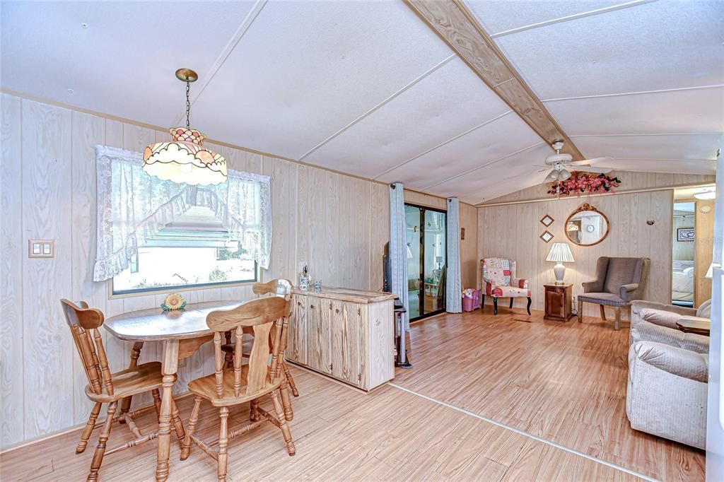 Chandelier, Dining room, Interior, Pendant Lights, Wood Texture Flooring, Wooden Walls