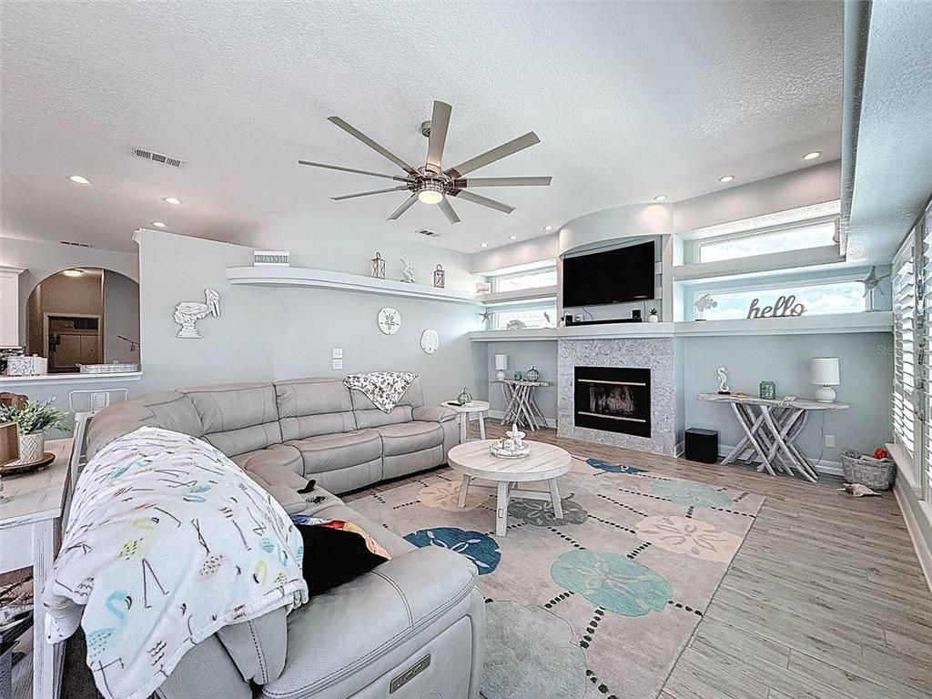 Fireplace, Interior, Living room, Recessed Lighting, Wood Texture Flooring