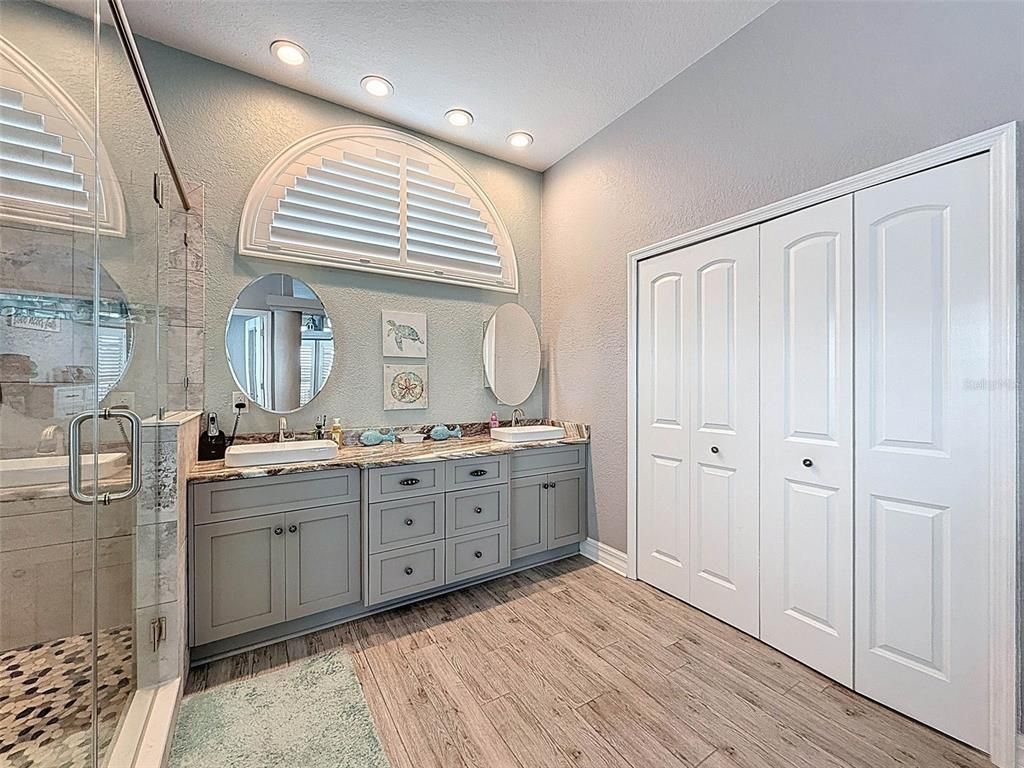Bathroom, Dual Sink Vanities, Glass Shower, Interior, Recessed Lighting, Wood Texture Flooring