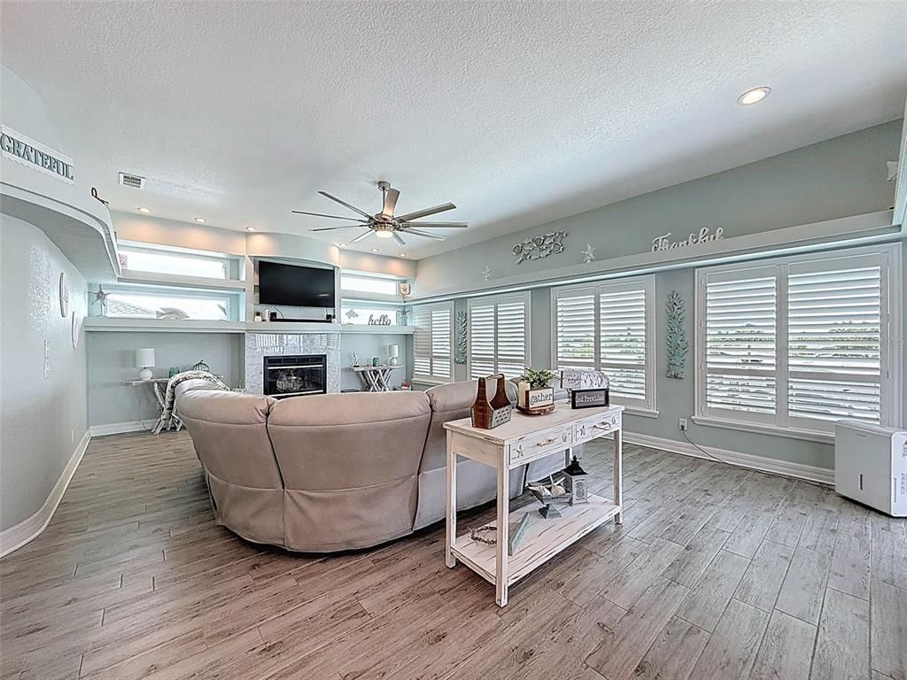 Fireplace, Home Office, Interior, Living room, Recessed Lighting, Wood Texture Flooring