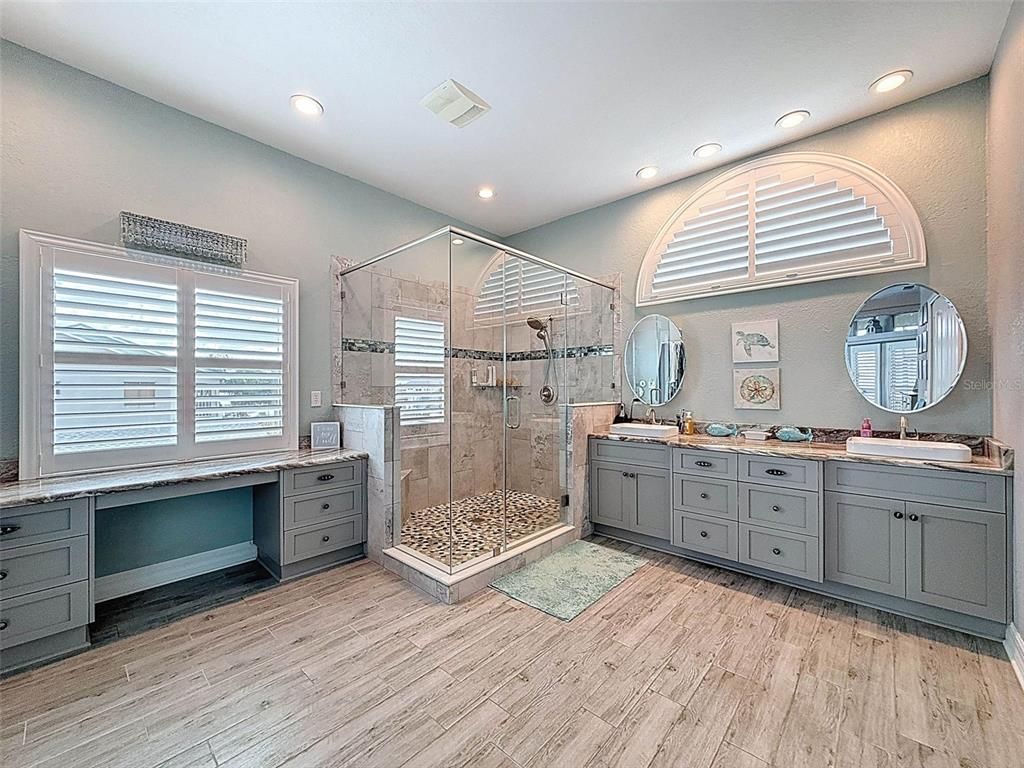 Bathroom, Dual Sink Vanities, Glass Shower, Interior, Recessed Lighting, Wood Texture Flooring