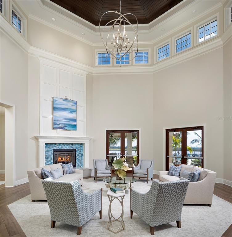 Chandelier, Fireplace, Interior, Living room, Recessed Lighting, Wooden Ceilings, Wood Texture Flooring