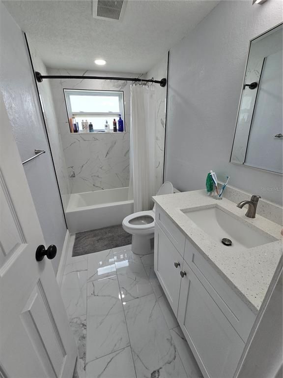Bathroom, Dual Sink Vanities, Interior, Marble, Marble Walls, Recessed Lighting
