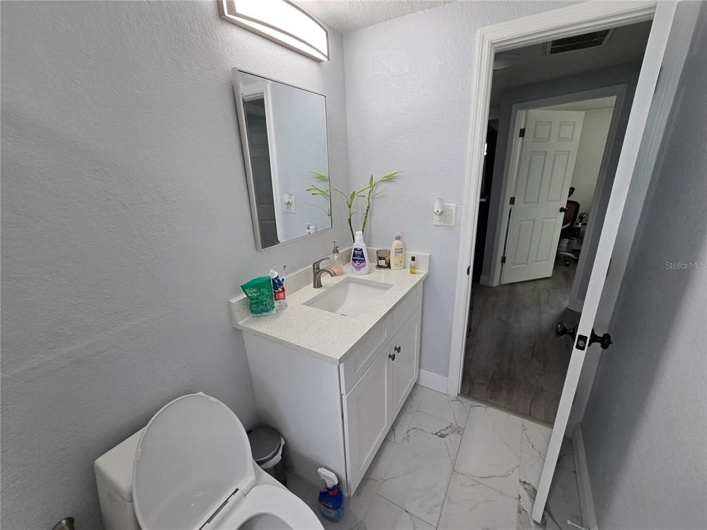 Bathroom, Dual Sink Vanities, Interior, Marble, Wood Texture Flooring