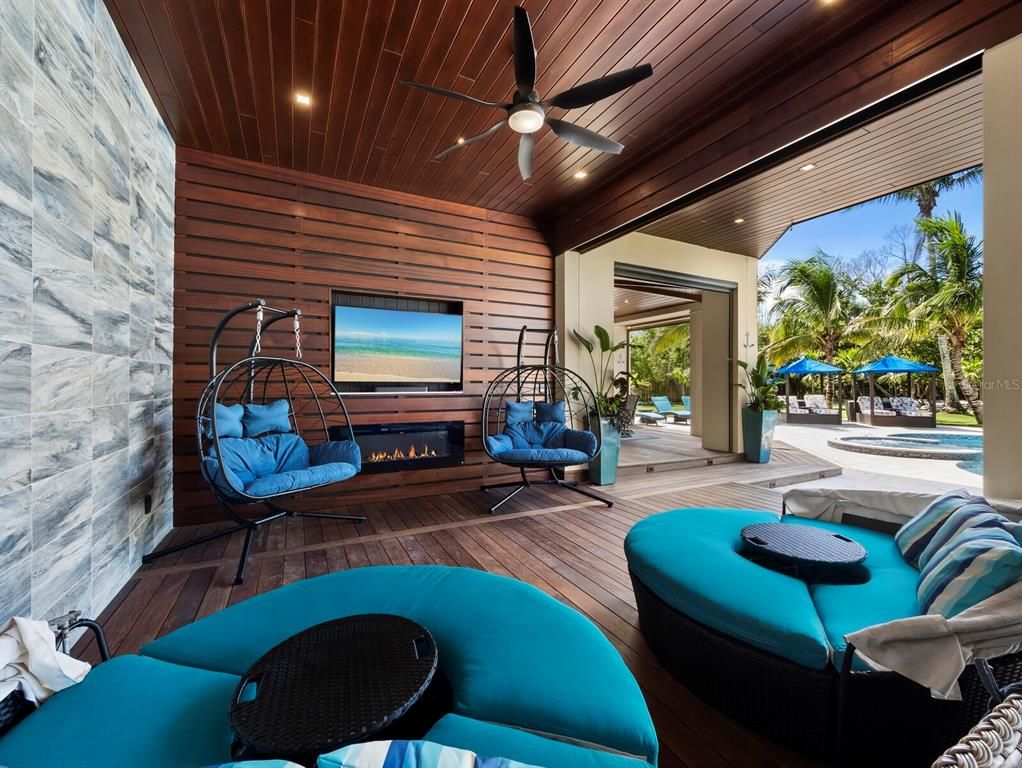 Exterior, Fireplace, Hot Tub, Recessed Lighting, Wood Texture Flooring, Wooden Walls