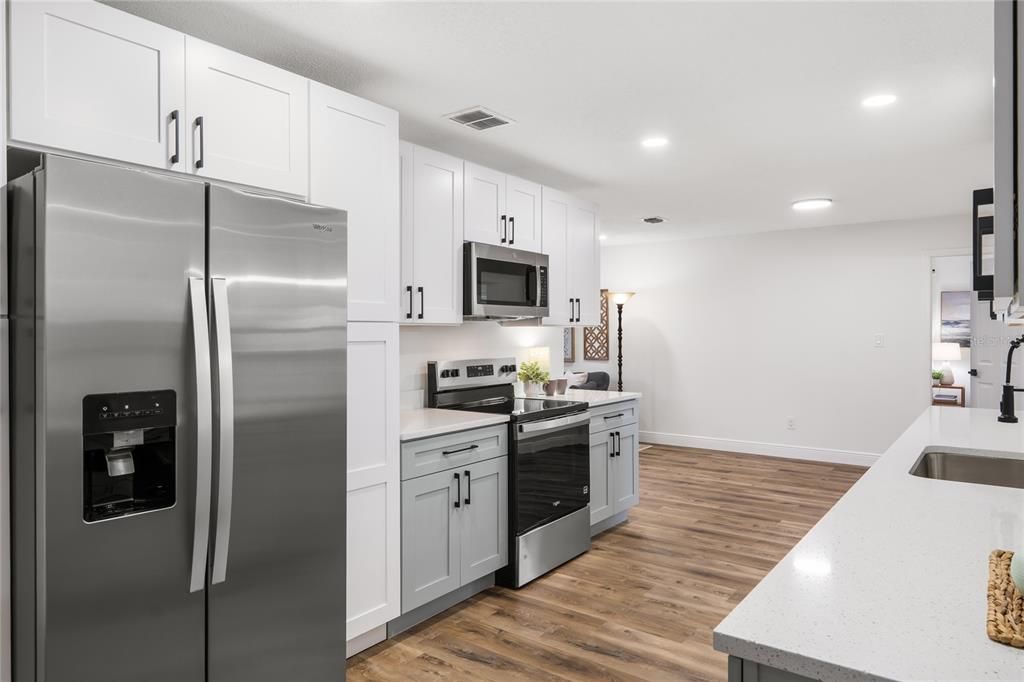 Interior, Kitchen, Recessed Lighting, Stainless Steel Appliances, Wood Texture Flooring