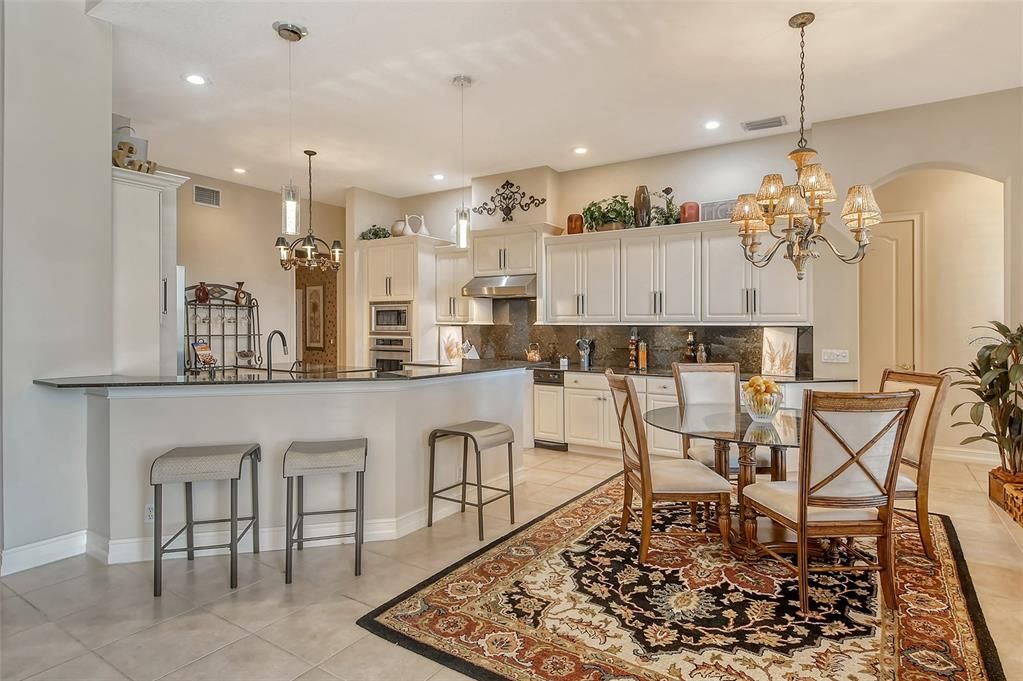 Chandelier, Dining room, Interior, Kitchen, Pendant Lights, Recessed Lighting, Stainless Steel Appliances