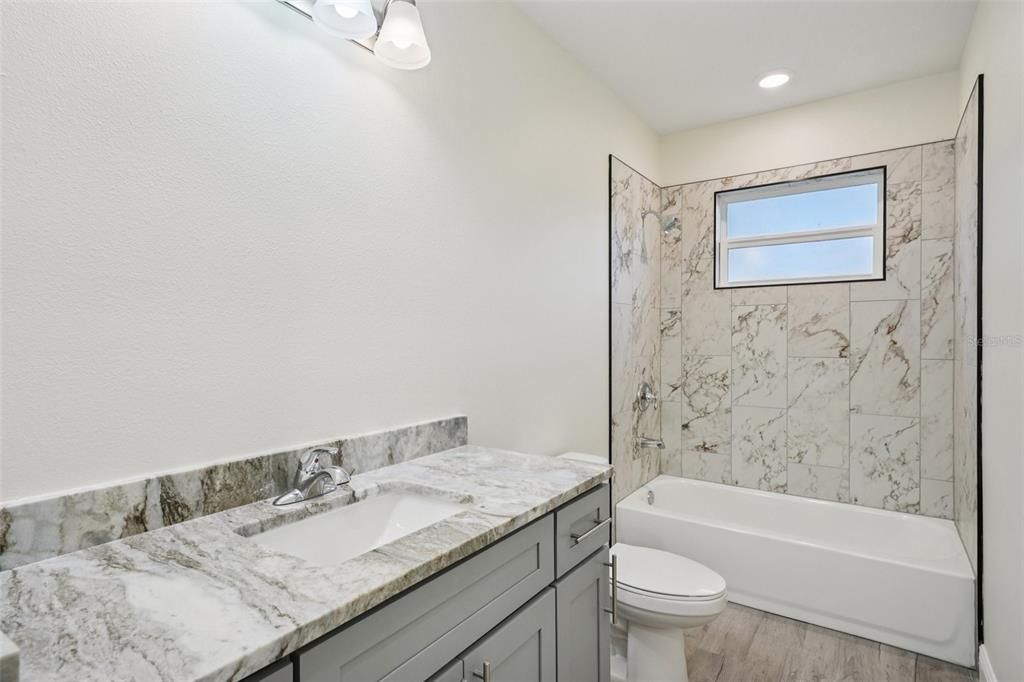 Bathroom, Interior, Marble Walls, Recessed Lighting, Wood Texture Flooring