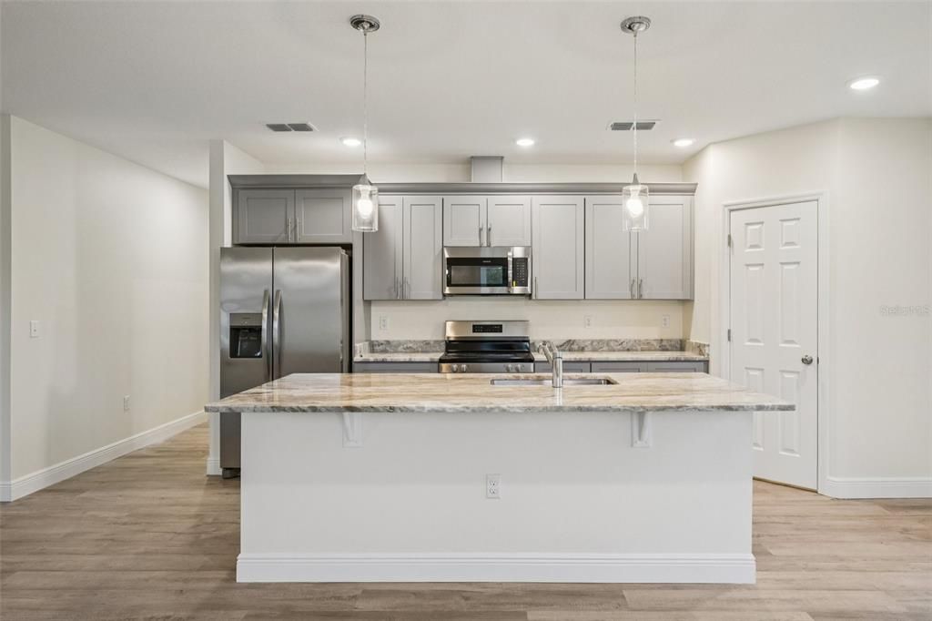 Interior, Kitchen, Pendant Lights, Recessed Lighting, Stainless Steel Appliances, Wood Texture Flooring