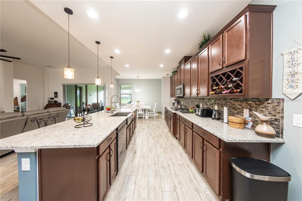 Dining room, Interior, Kitchen, Living room, Pendant Lights, Recessed Lighting, Wood Texture Flooring