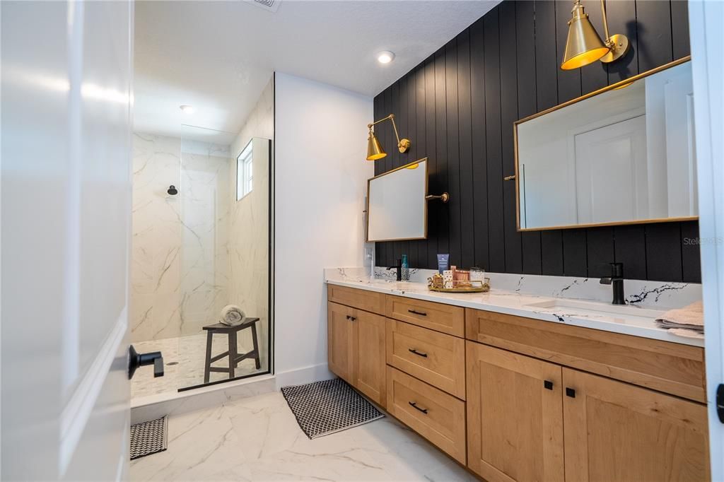 Bathroom, Dual Sink Vanities, Interior, Marble, Marble Walls, Recessed Lighting