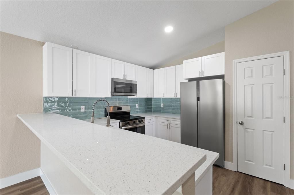 Interior, Kitchen, Recessed Lighting, Stainless Steel Appliances, Wood Texture Flooring