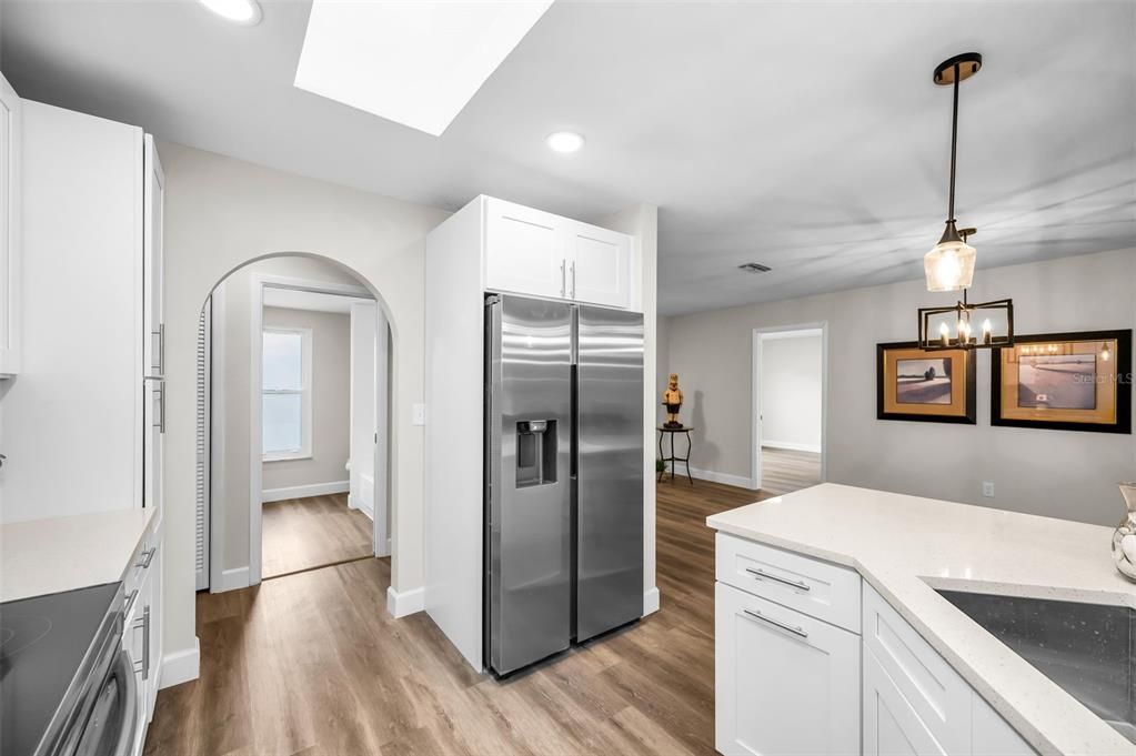 Interior, Kitchen, Pendant Lights, Recessed Lighting, Stainless Steel Appliances, Wood Texture Flooring