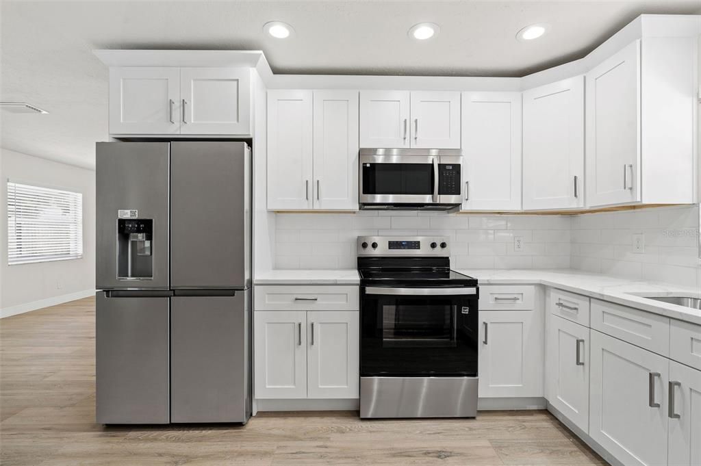 Interior, Kitchen, Recessed Lighting, Stainless Steel Appliances, Wood Texture Flooring