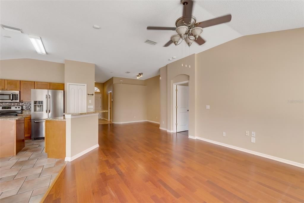 Empty room, Interior, Kitchen, Stainless Steel Appliances, Wood Texture Flooring