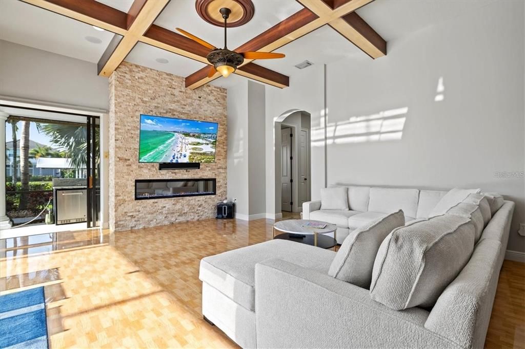 Fireplace, Interior, Living room, Recessed Lighting, Stone Walls, Wooden Beams, Wood Texture Flooring