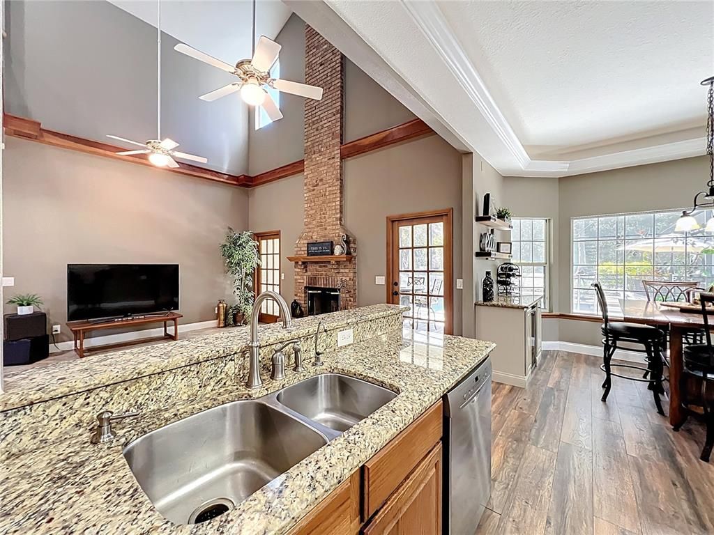 Dining room, Fireplace, Interior, Pendant Lights, Wood Texture Flooring
