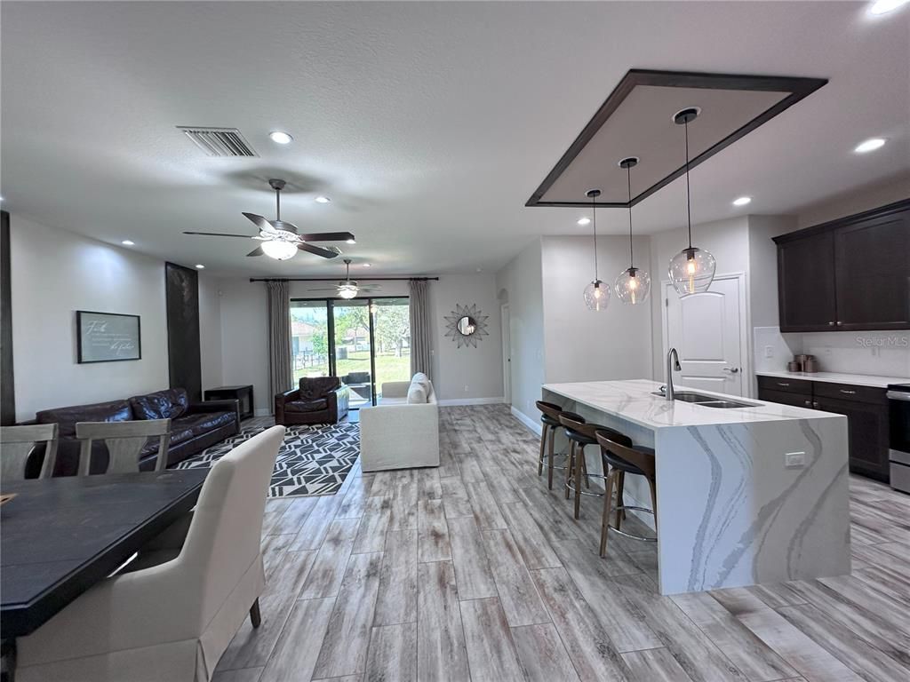 Dining room, Interior, Kitchen, Living room, Pendant Lights, Recessed Lighting, Wood Texture Flooring