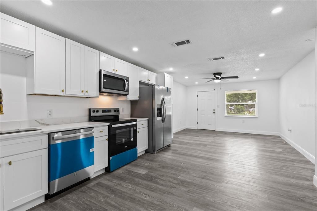 Interior, Kitchen, Recessed Lighting, Stainless Steel Appliances, Wood Texture Flooring