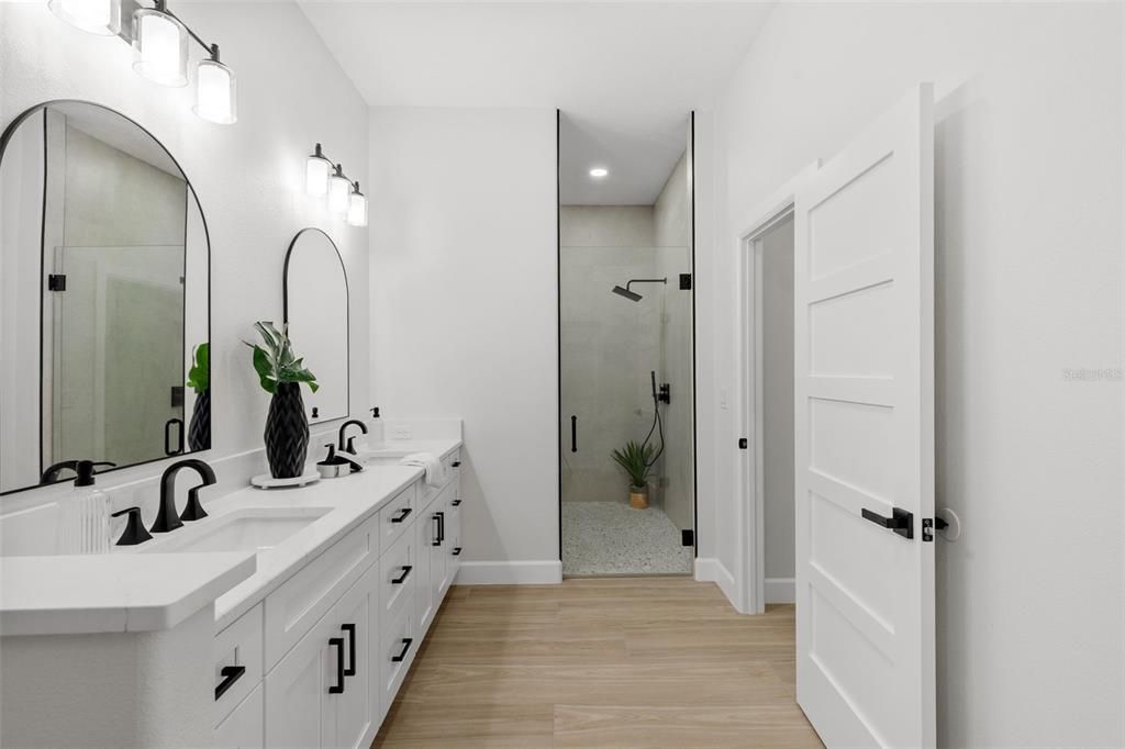 Bathroom, Dual Sink Vanities, Glass Shower, Interior, Recessed Lighting, Wood Texture Flooring