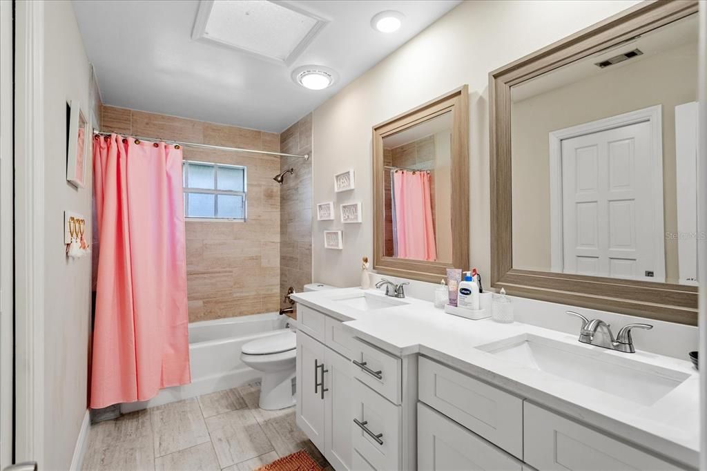 Bathroom, Dual Sink Vanities, Interior, Recessed Lighting, Wood Texture Flooring