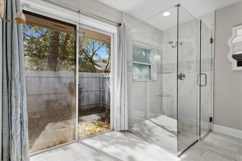 Bathroom, Glass Shower, Interior, Marble Walls, Recessed Lighting, Wood Texture Flooring