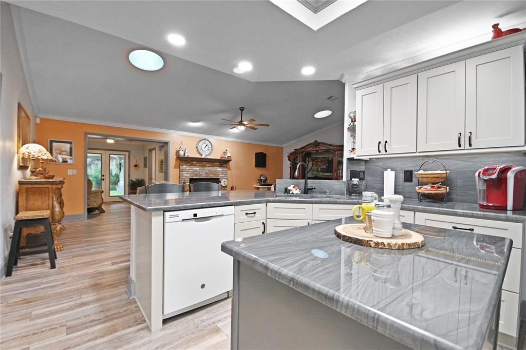 Fireplace, Interior, Kitchen, Recessed Lighting, Wood Texture Flooring