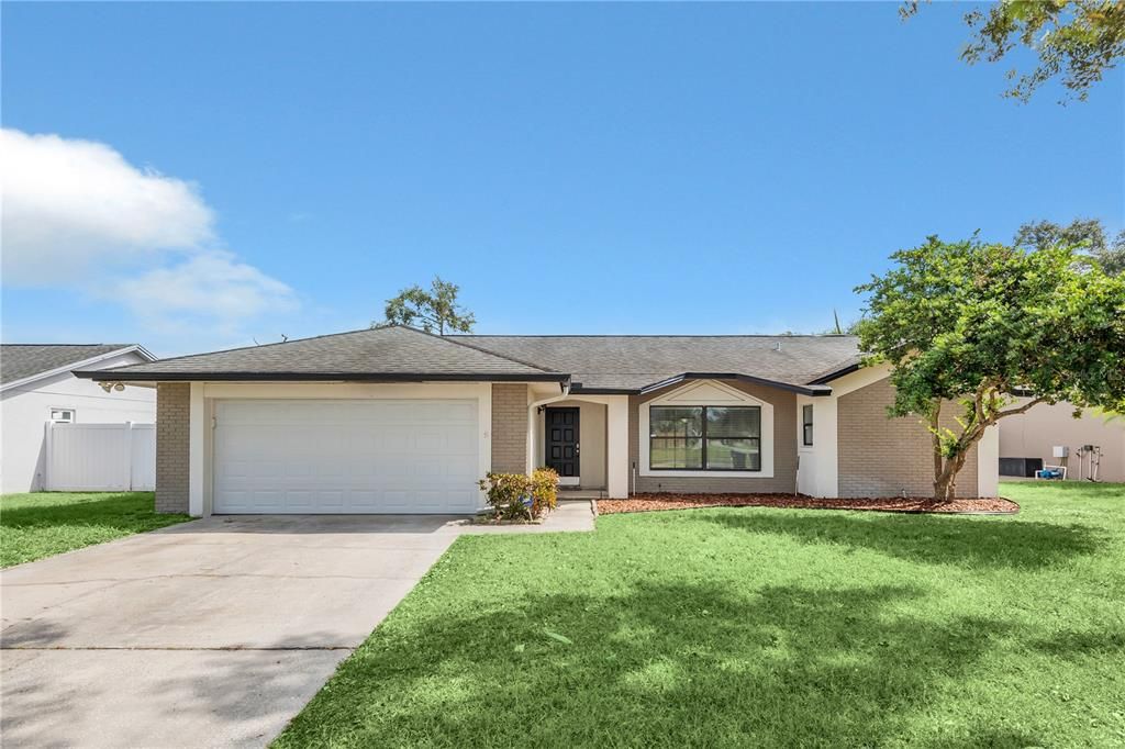 Attached, Backyard, Exterior, Facade, Brick Facade, Ranch