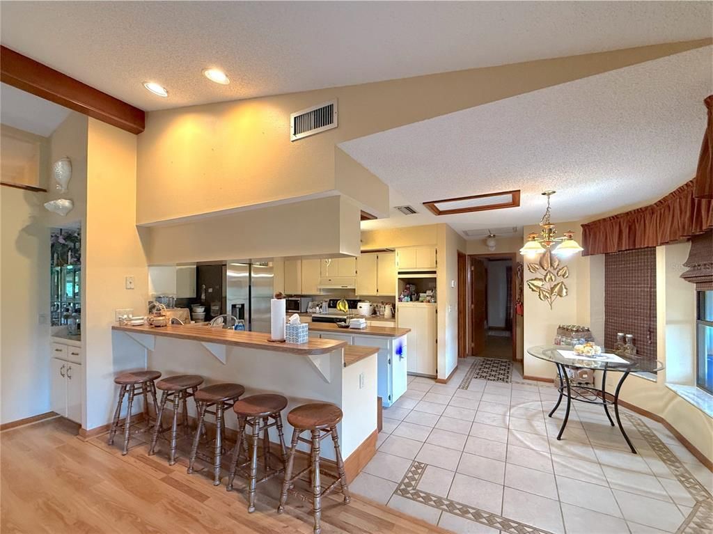 Chandelier, Interior, Kitchen, Recessed Lighting, Stainless Steel Appliances, Wood Texture Flooring
