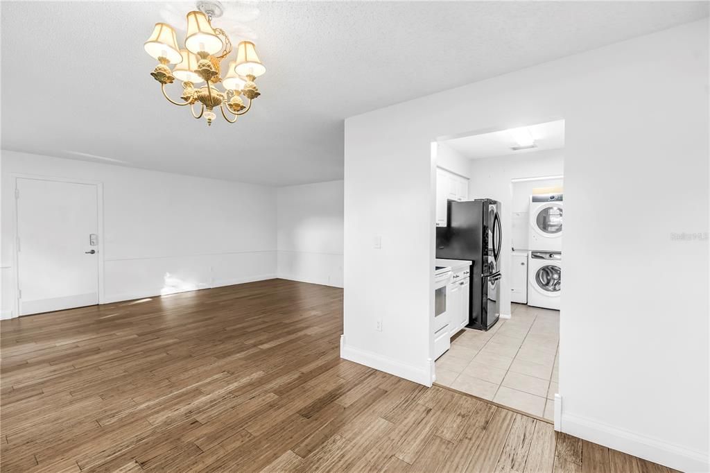 Chandelier, Empty room, Interior, Kitchen, Washer, Wood Texture Flooring
